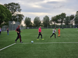 Laatste training S.K.N.W.K. JO11-1JM (partijtje tegen de ouders) van maandag 27 mei 2024 (85/137)